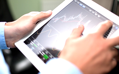 Man Checking a Financial Chart